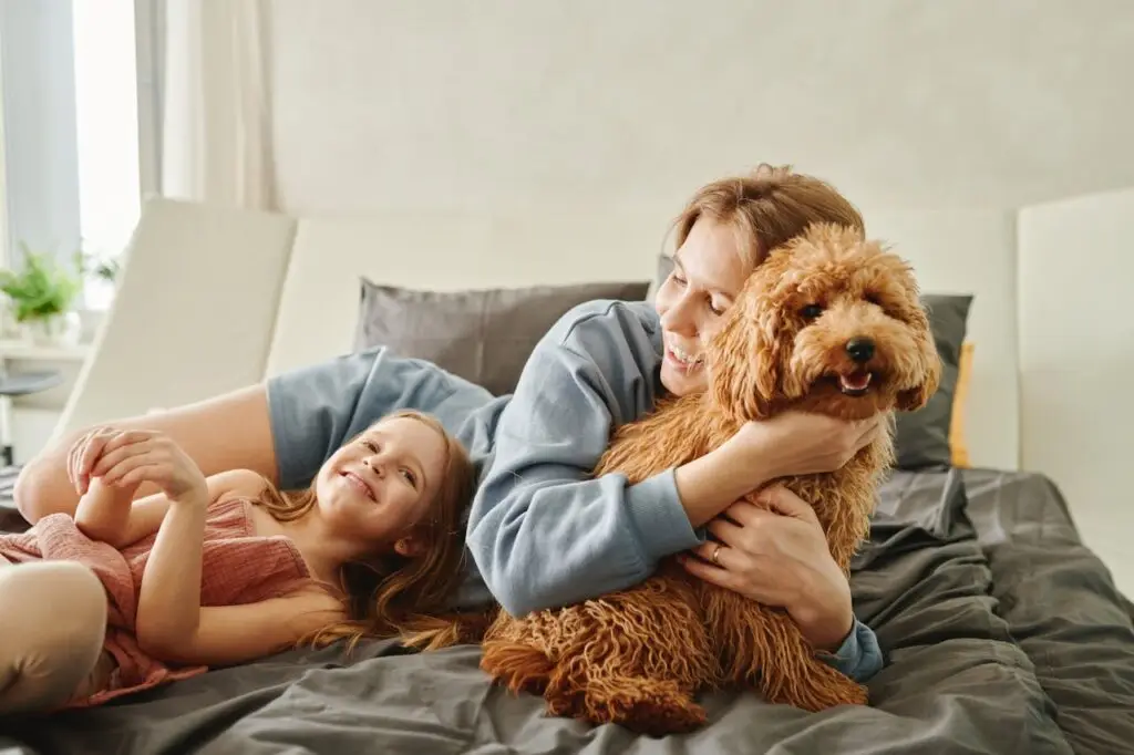 Mother and Daughter Lying on the Bed